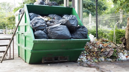 Eco-friendly garden clearance practices with recycling